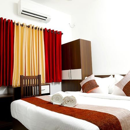 Puthens Clifton Inn Kottayam Esterno foto