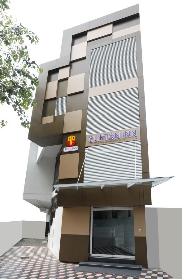 Puthens Clifton Inn Kottayam Esterno foto