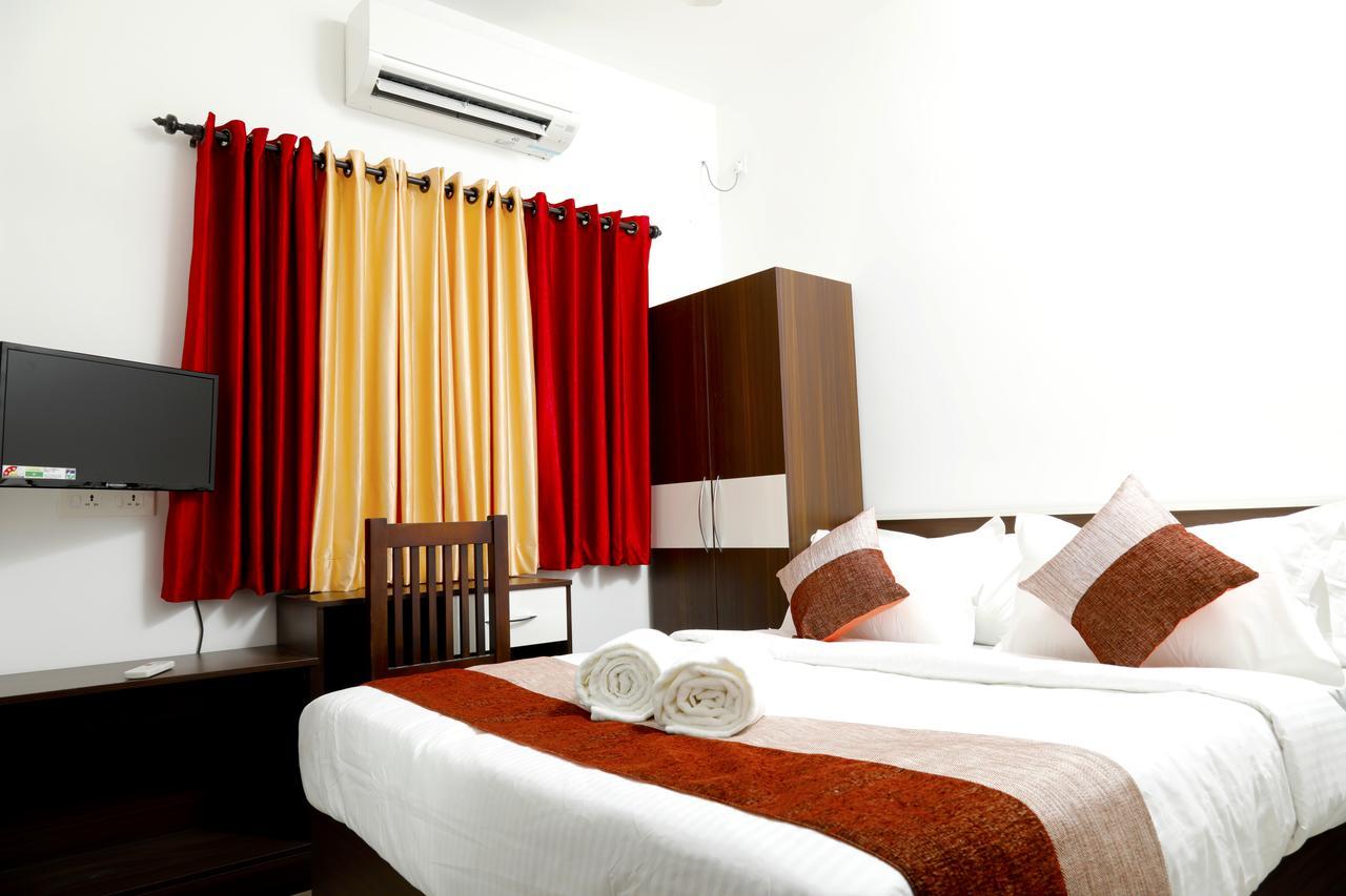 Puthens Clifton Inn Kottayam Esterno foto