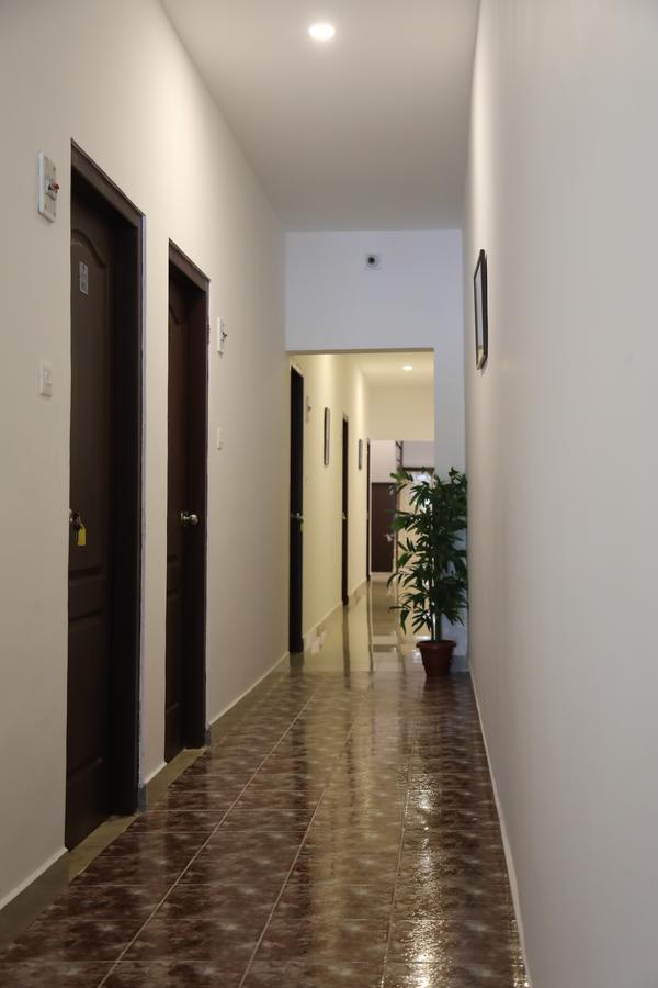 Puthens Clifton Inn Kottayam Esterno foto