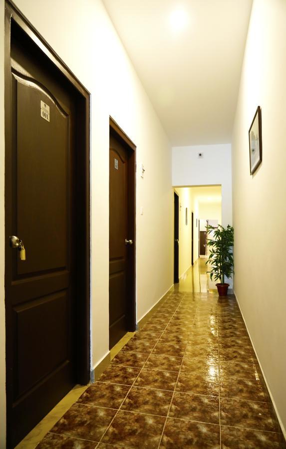 Puthens Clifton Inn Kottayam Esterno foto