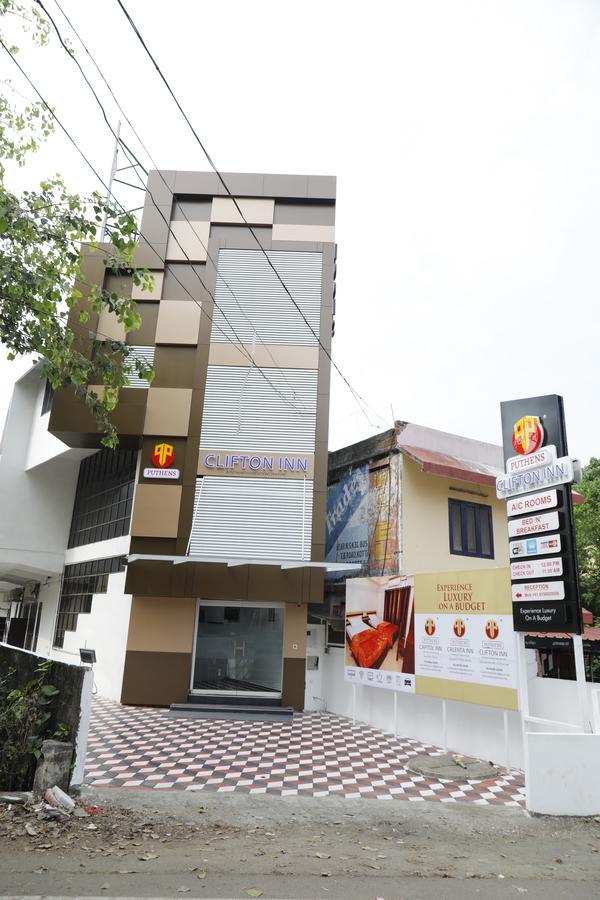 Puthens Clifton Inn Kottayam Esterno foto